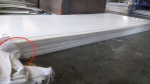 UHMW sheet used as impact liner in conveyor transfer point